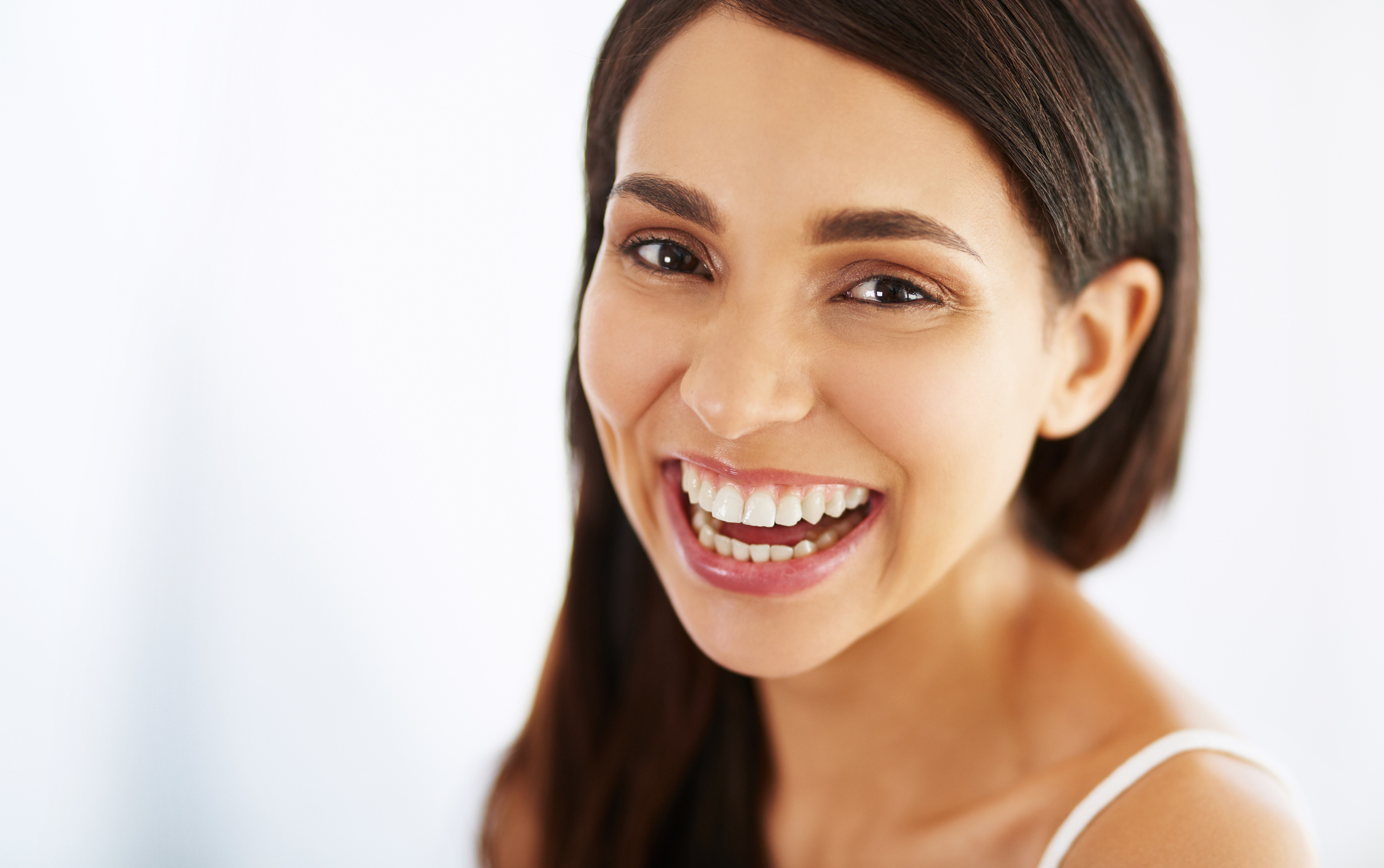 Women smiling with great skin tone and texture