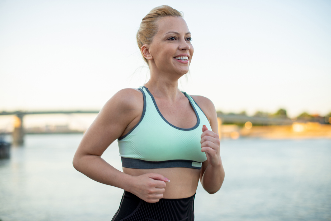 healthy women jogging with breast implants